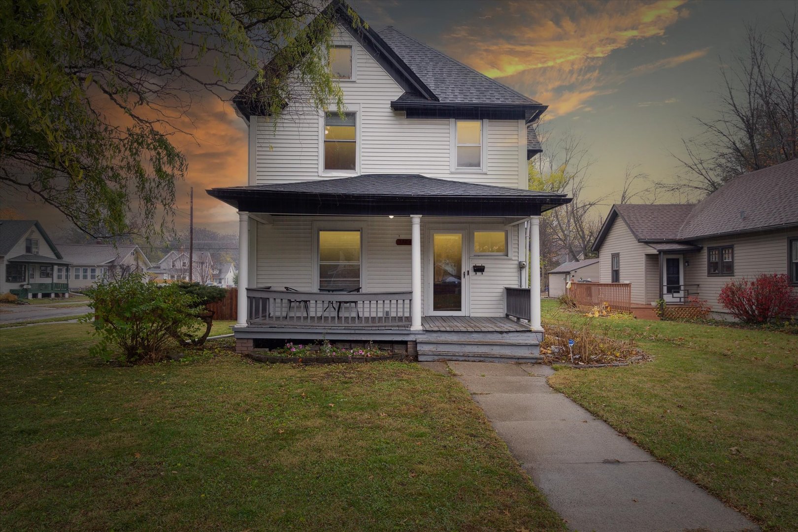 a front view of a house with garden