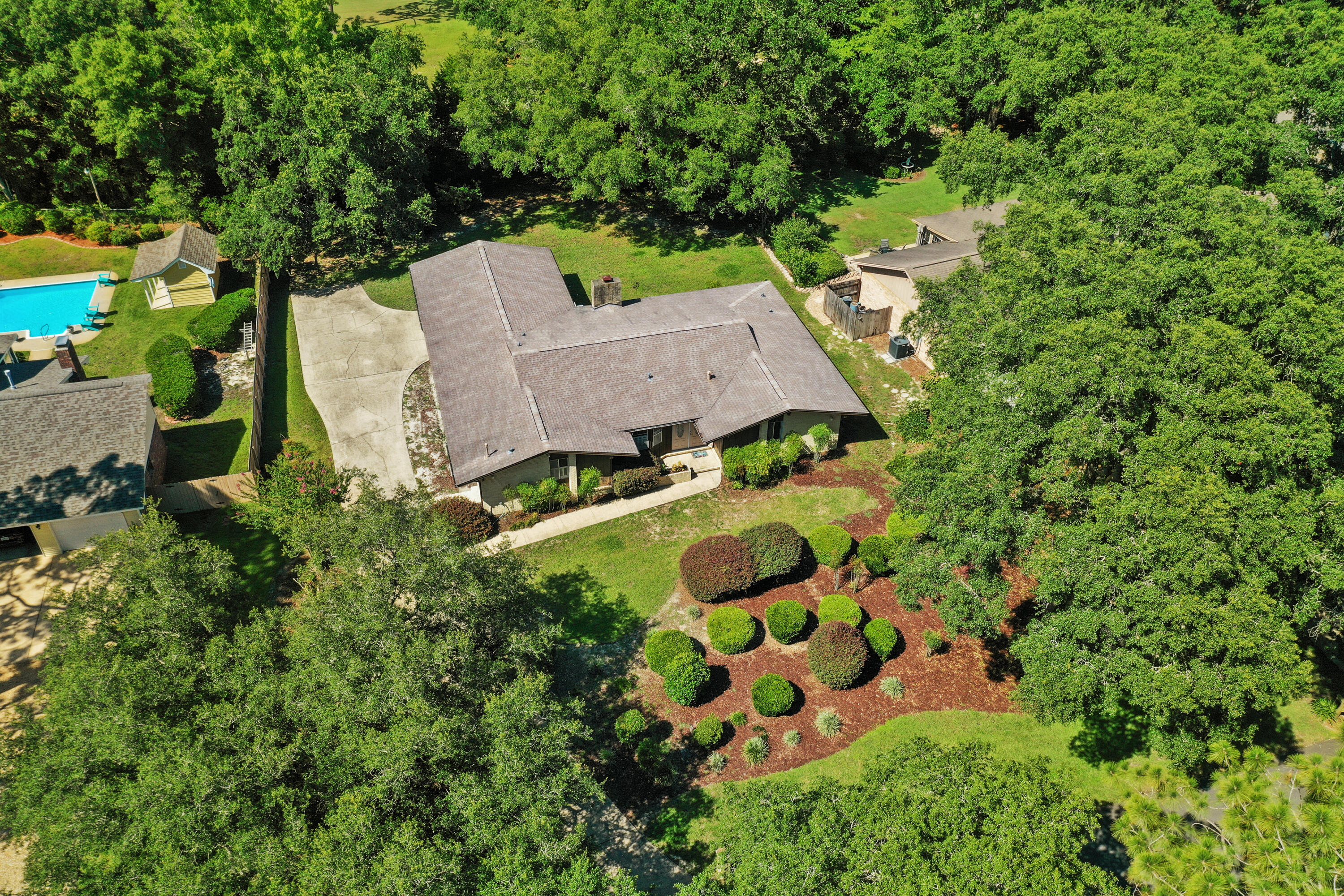 an aerial view of house with yard