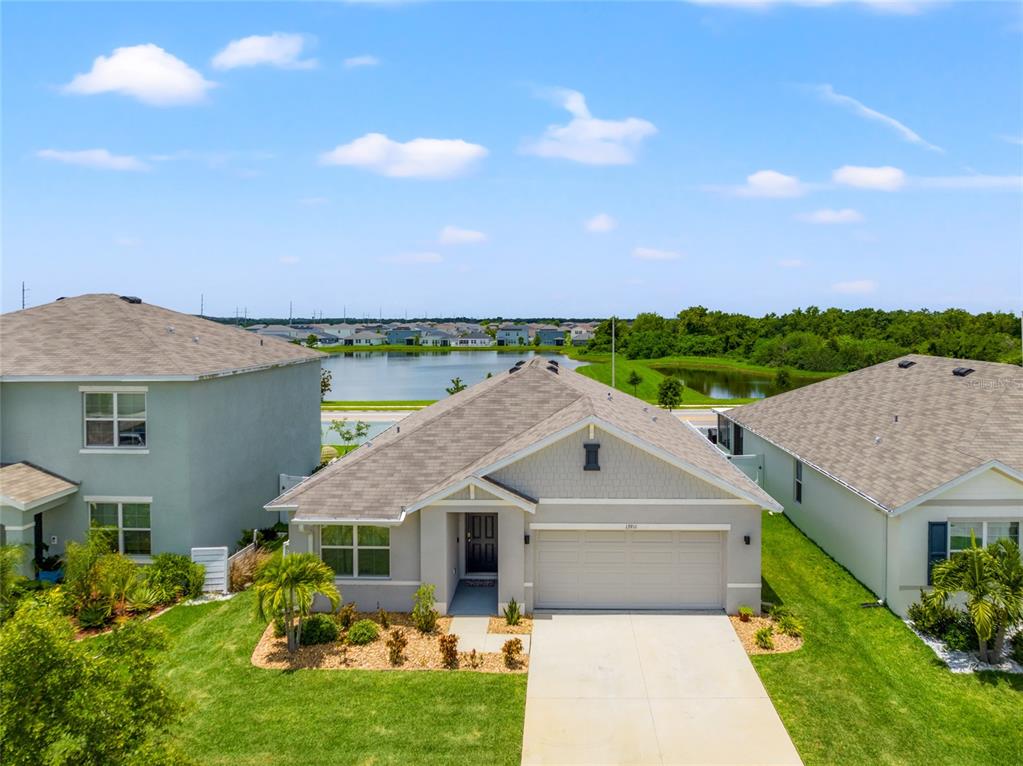 an aerial view of a house with a garden