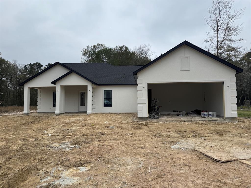 a house with yard in front of it