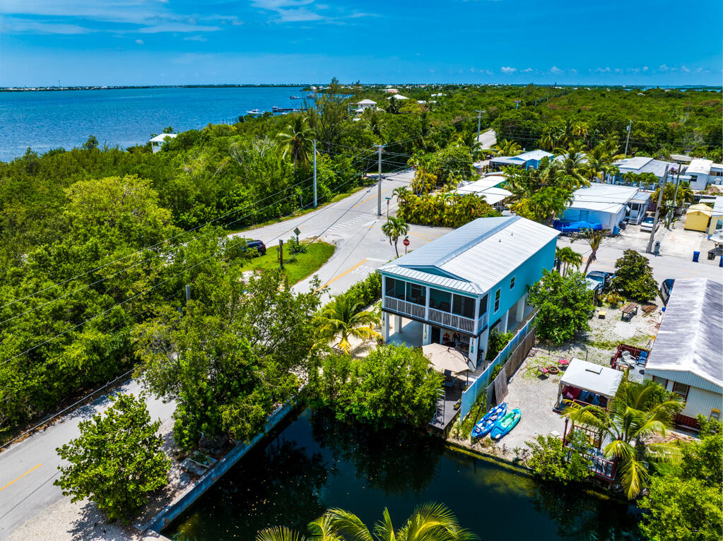 an aerial view of a house with a garden