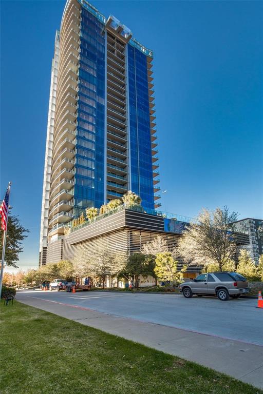 a view of a building with a yard