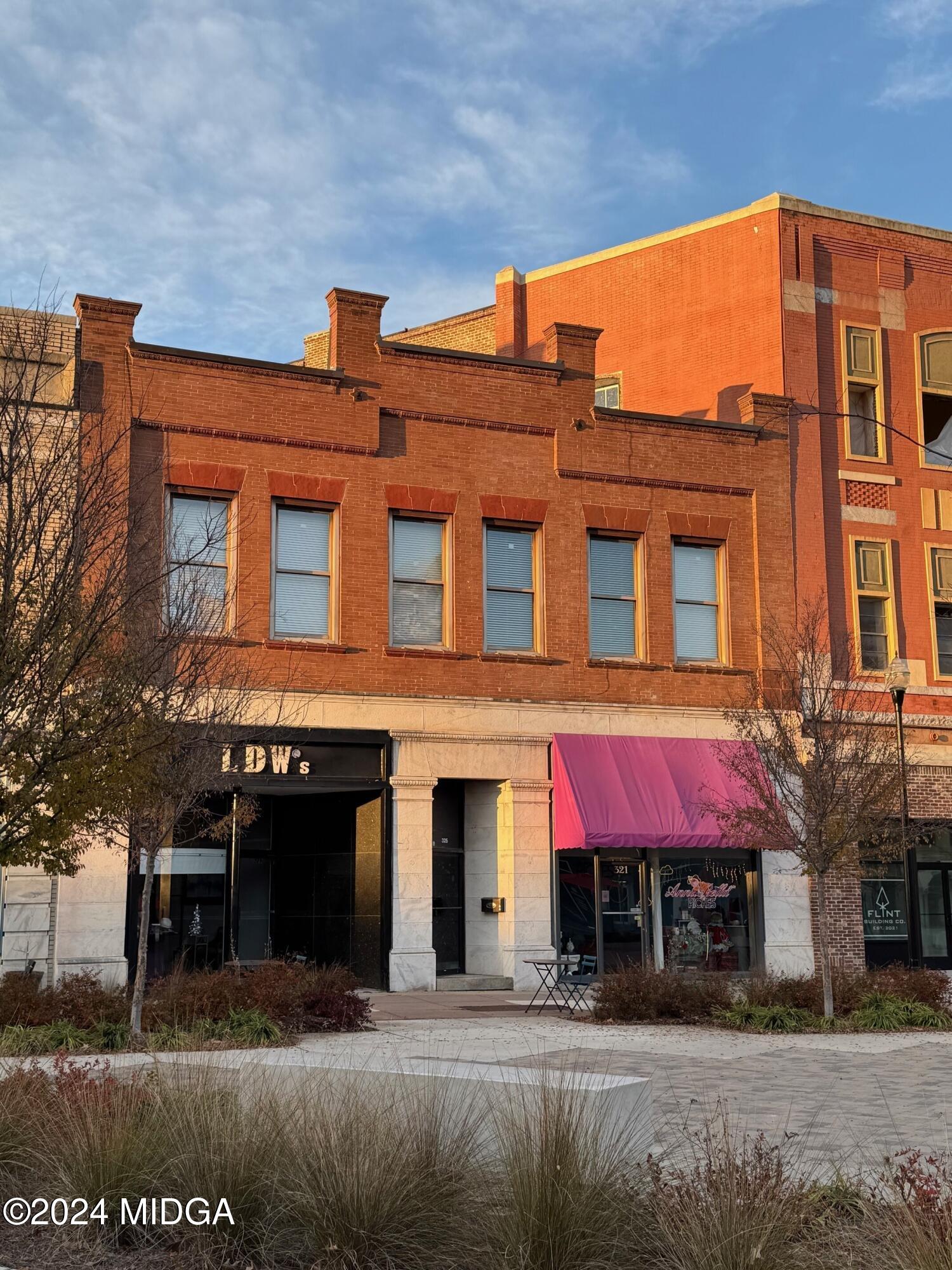 a front view of a building with street