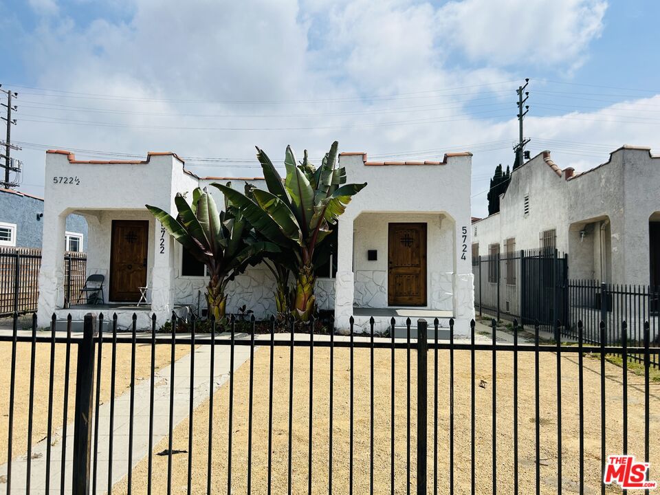 a front view of a house with balcony