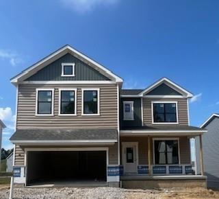 a front view of a house with yard