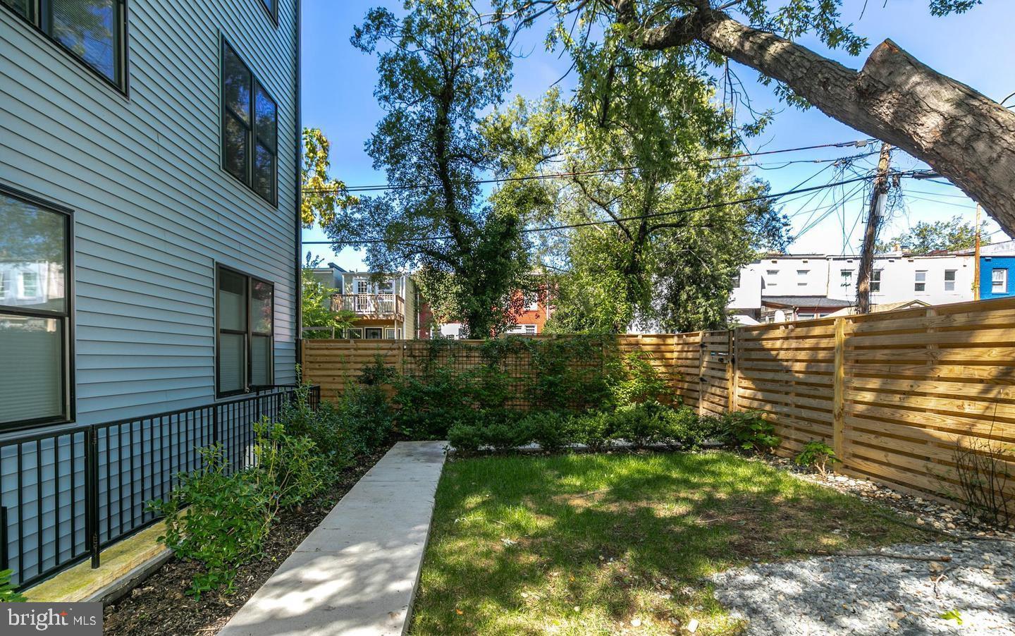 a view of a back yard of the house