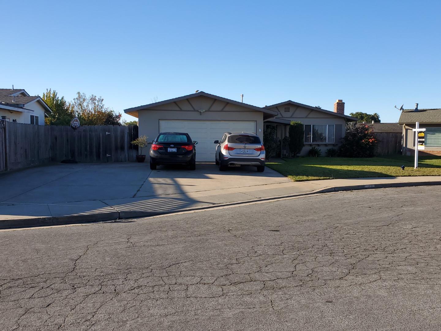 a car parked in front of a house