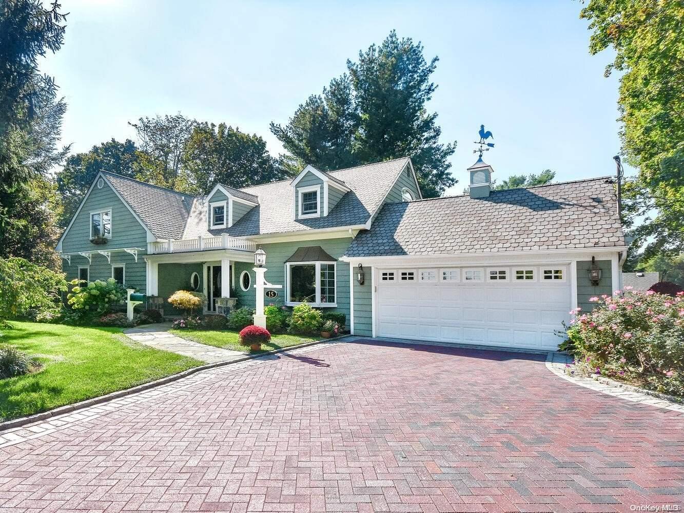 Front Of House With Brick Driveway