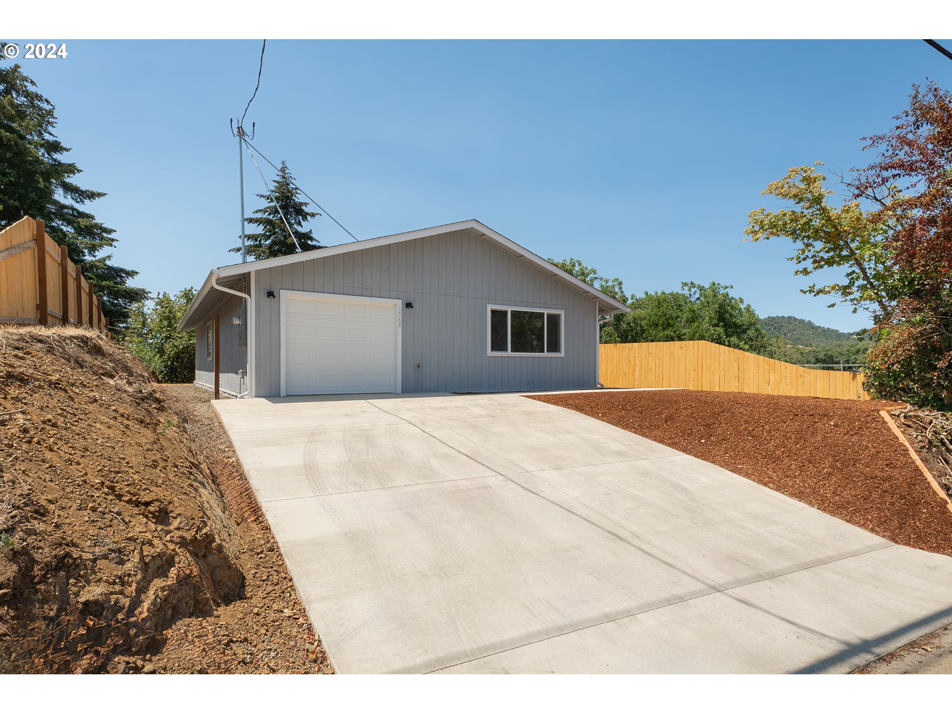 a view of backyard of house