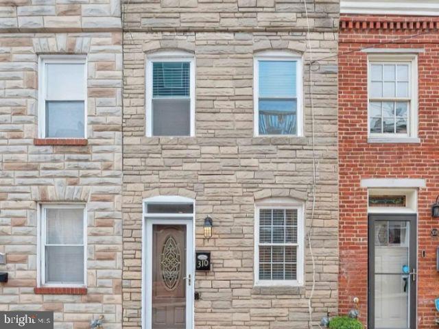 a front view of a brick house