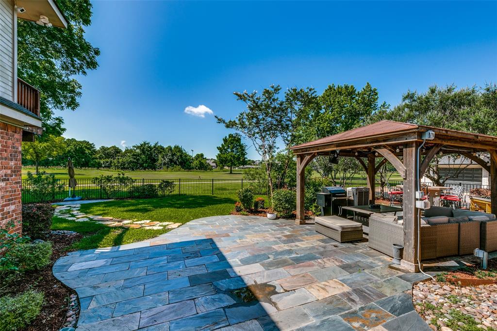 a view of swimming pool with a patio