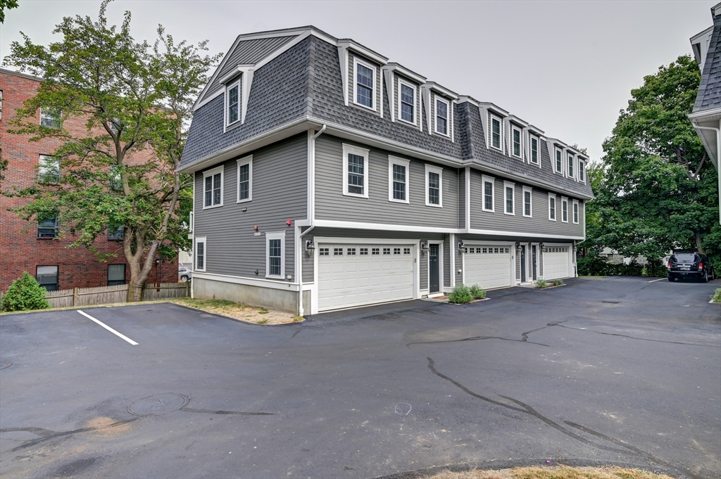 a view of a house with a street