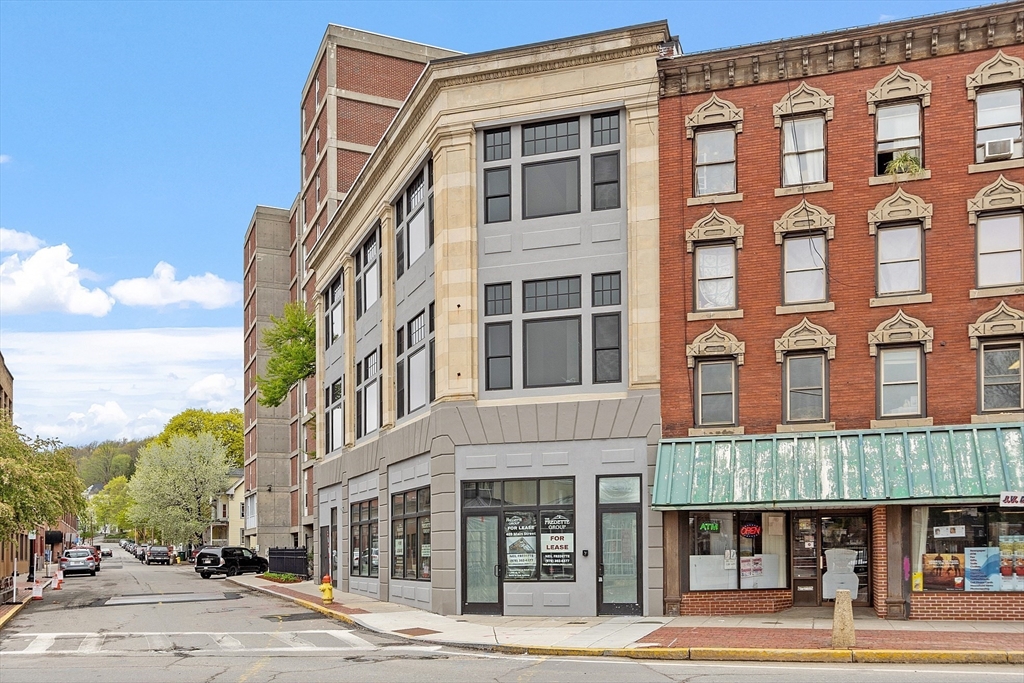 a front view of a building and a street