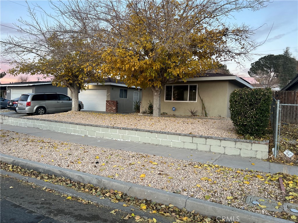 a house with trees in front of it