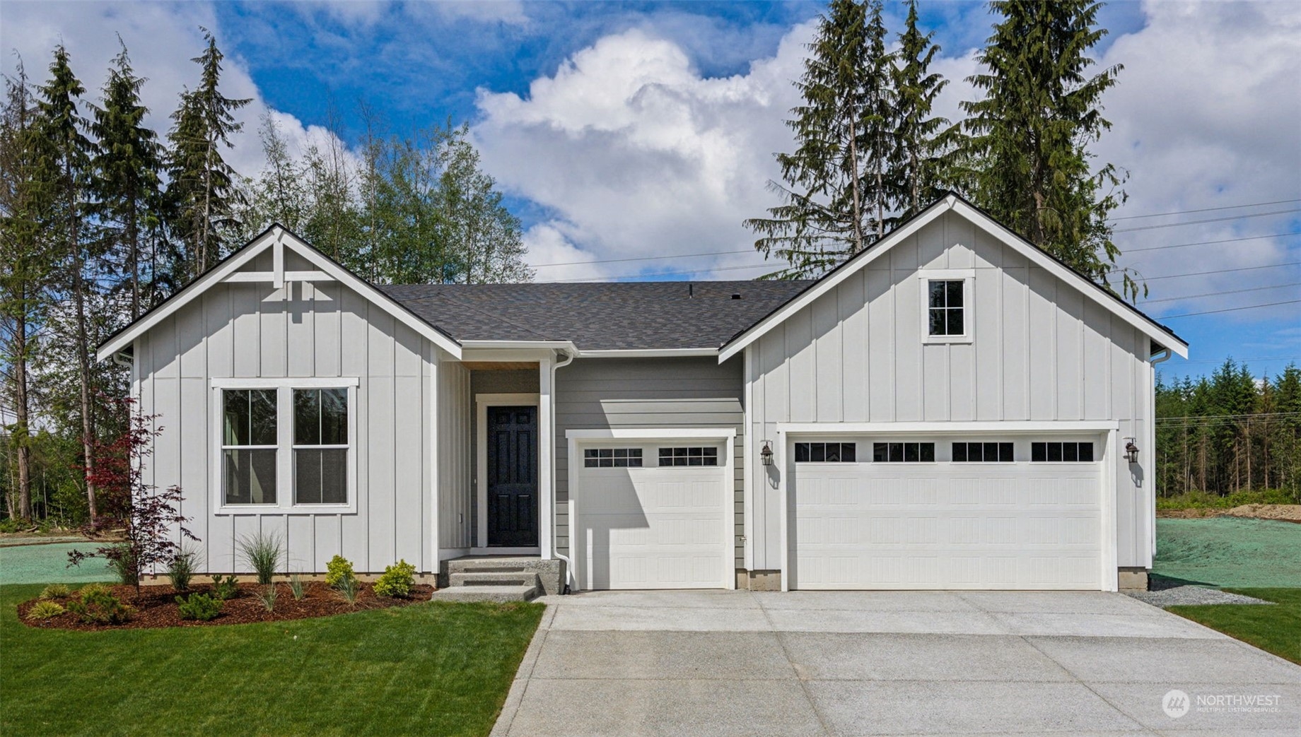 a view of front of house with a yard