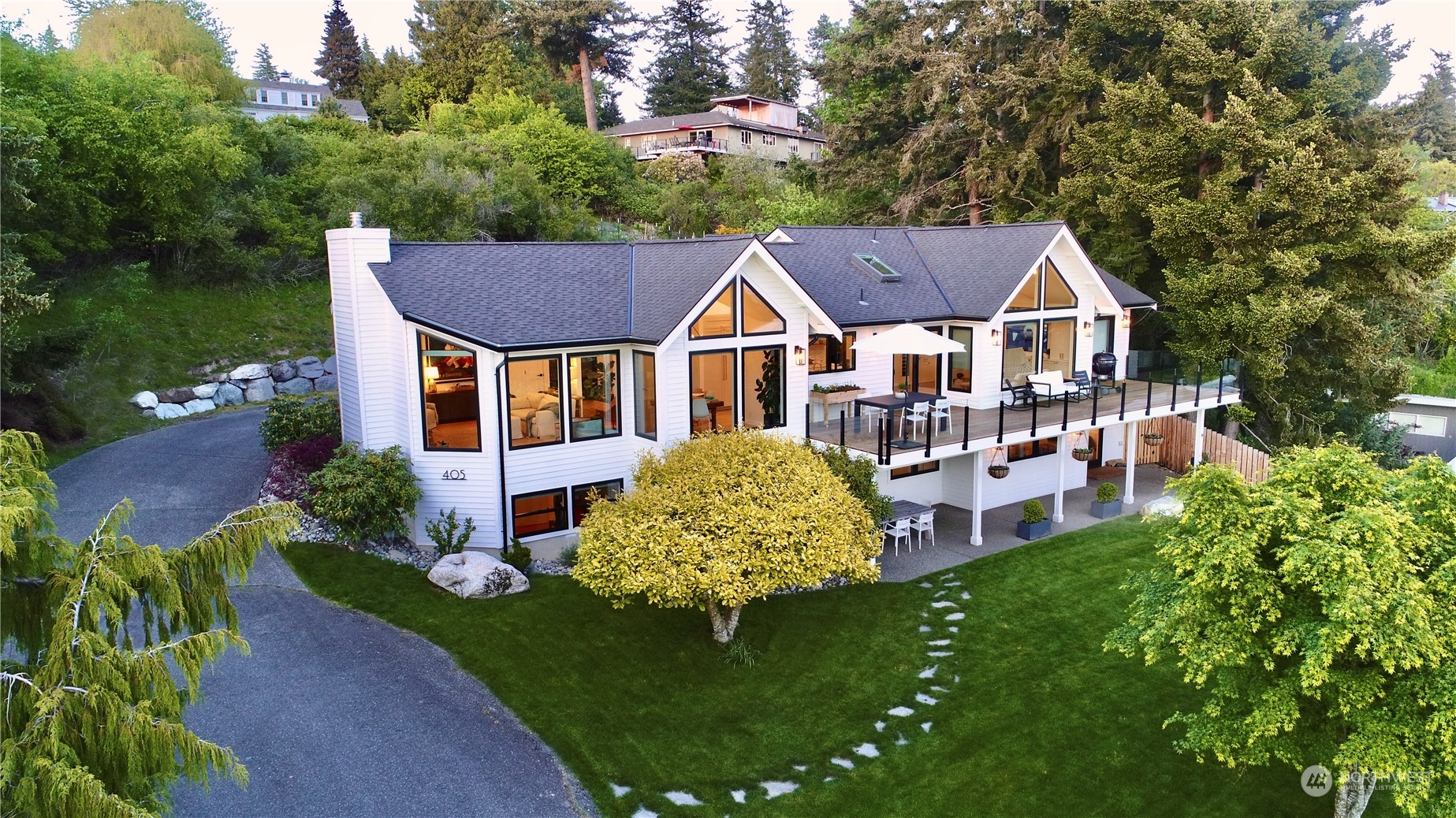 a aerial view of a house with a garden and plants