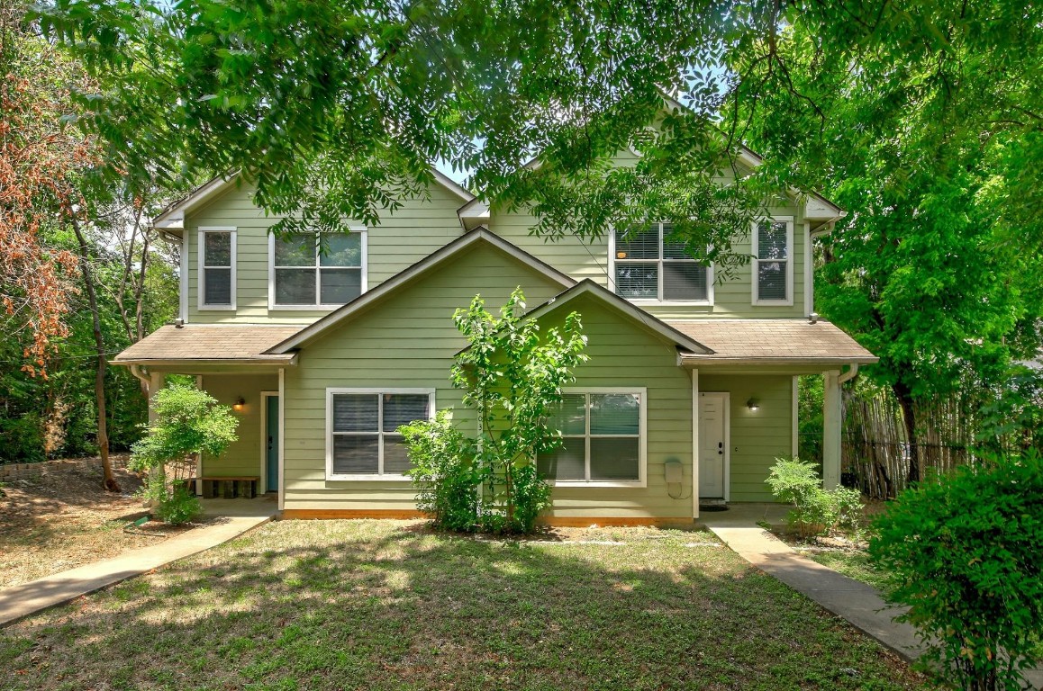 front view of a house with a yard