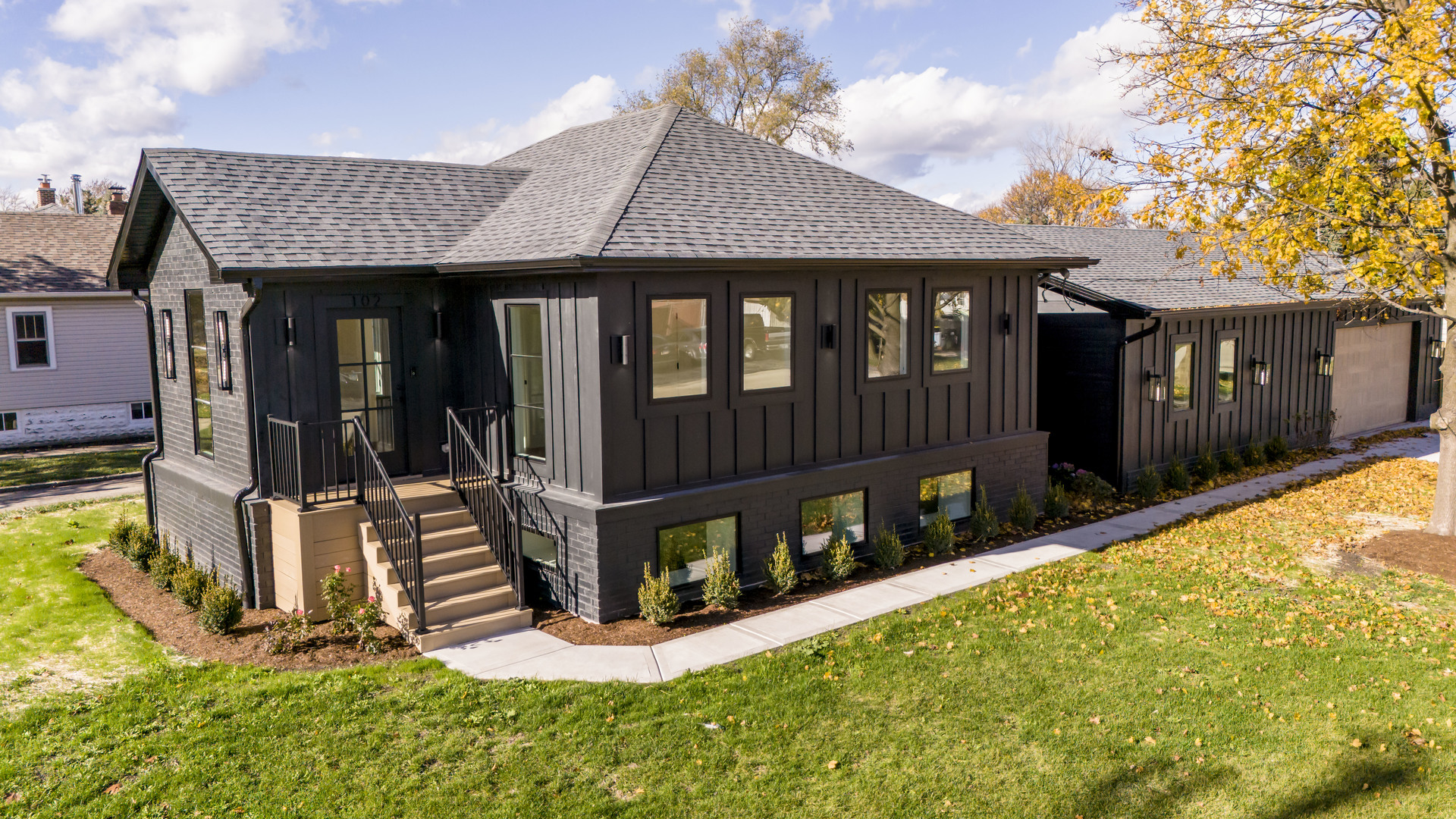 front view of a house with a yard