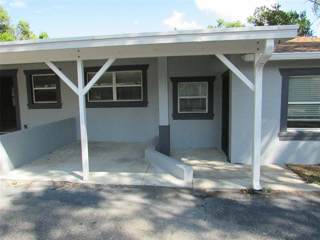 a view of house with garage