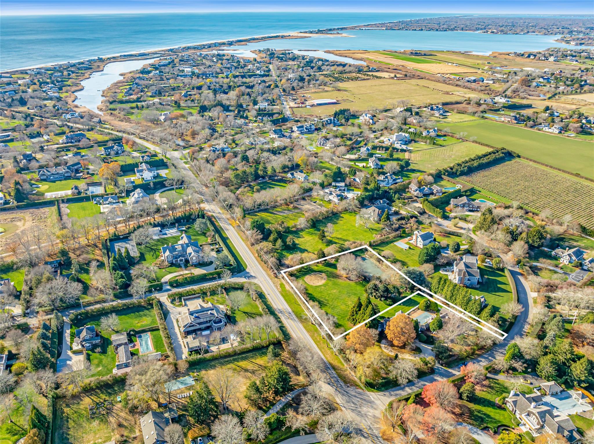 Drone / aerial view featuring a water view and a rural view