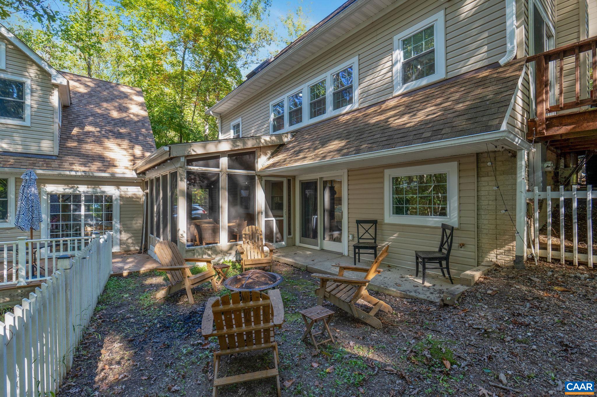 Relax in this private and shaded back yard amongst the nature