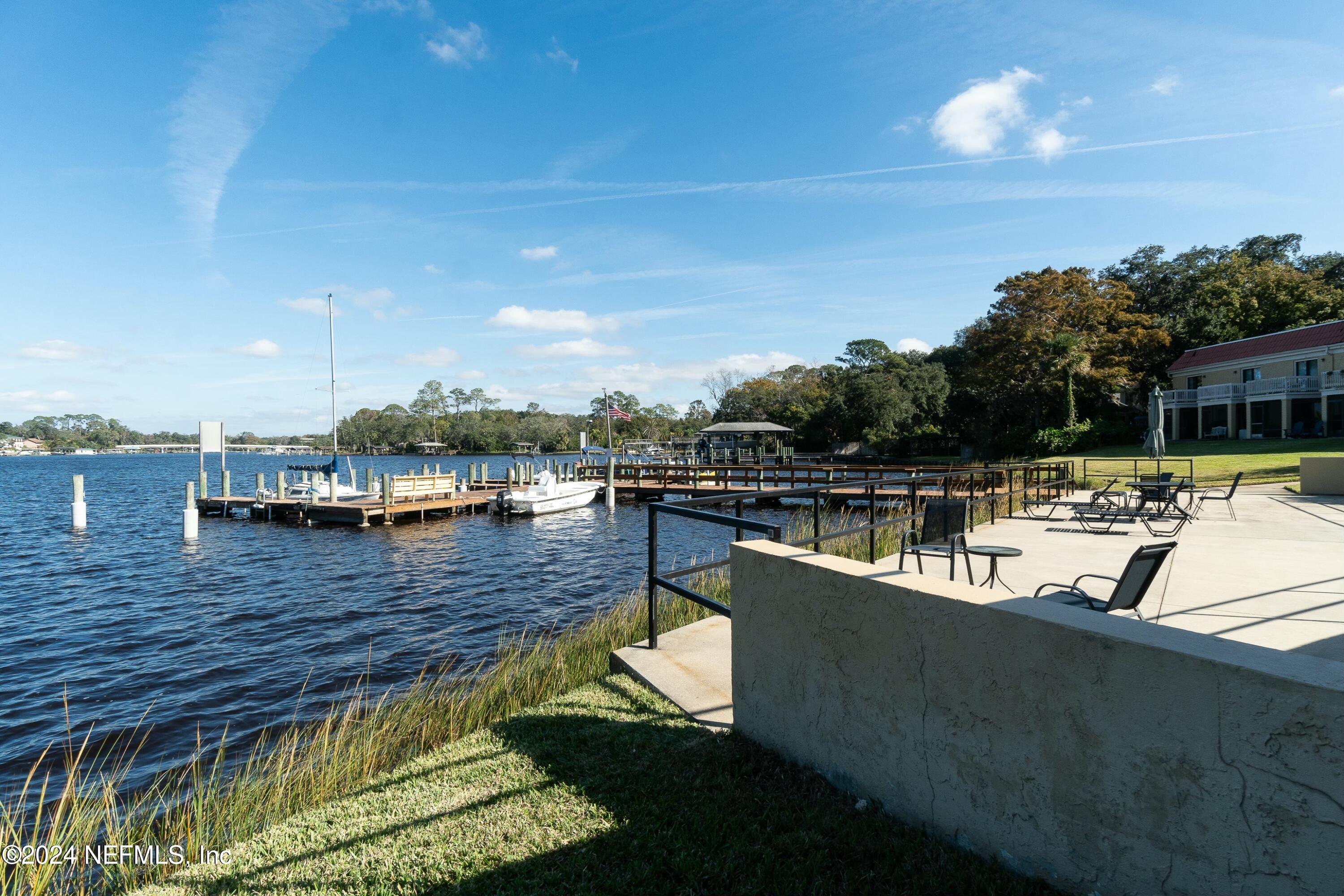 a view of a lake with a house