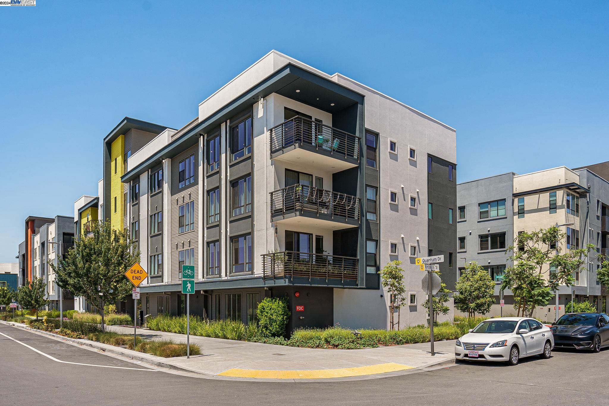 a view of a car parked in front of a building