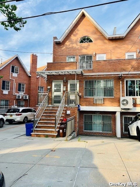 a front view of a house with a garage