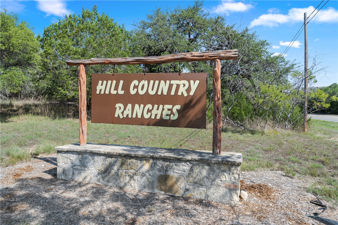 a sign on the side of the road