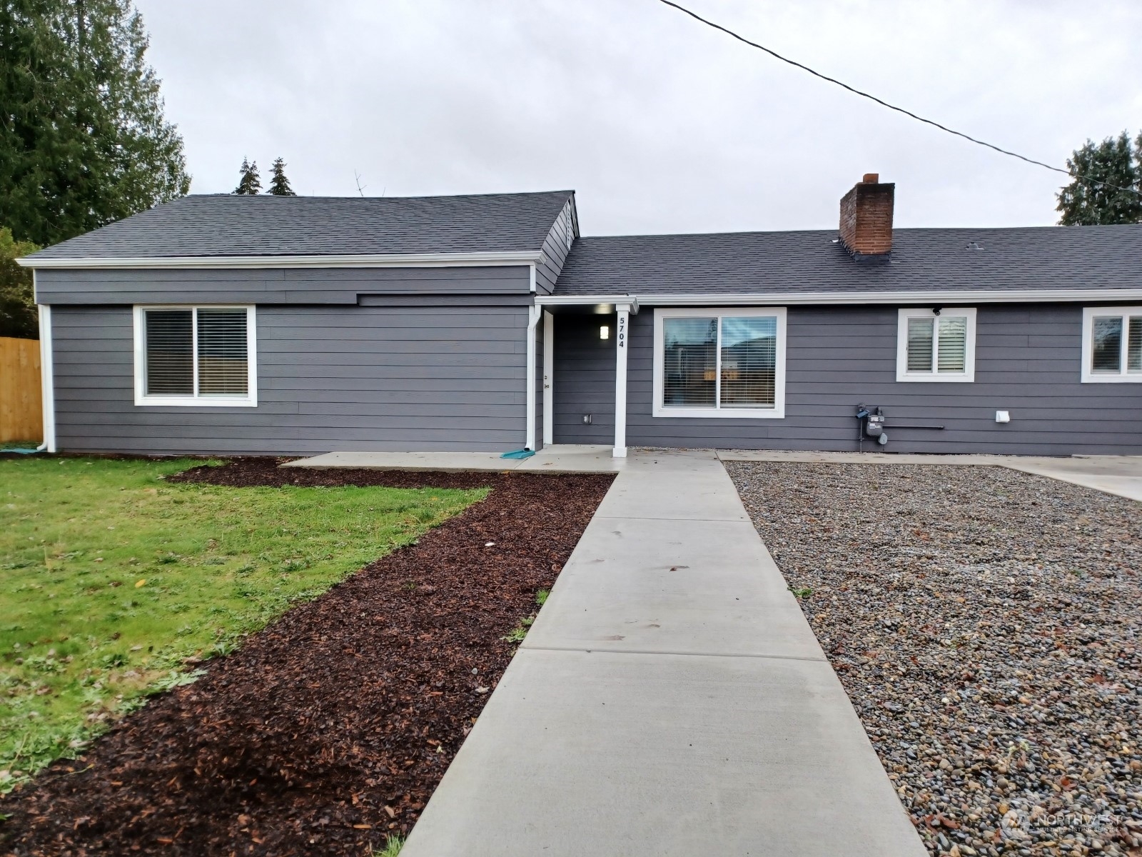 a front view of house with yard