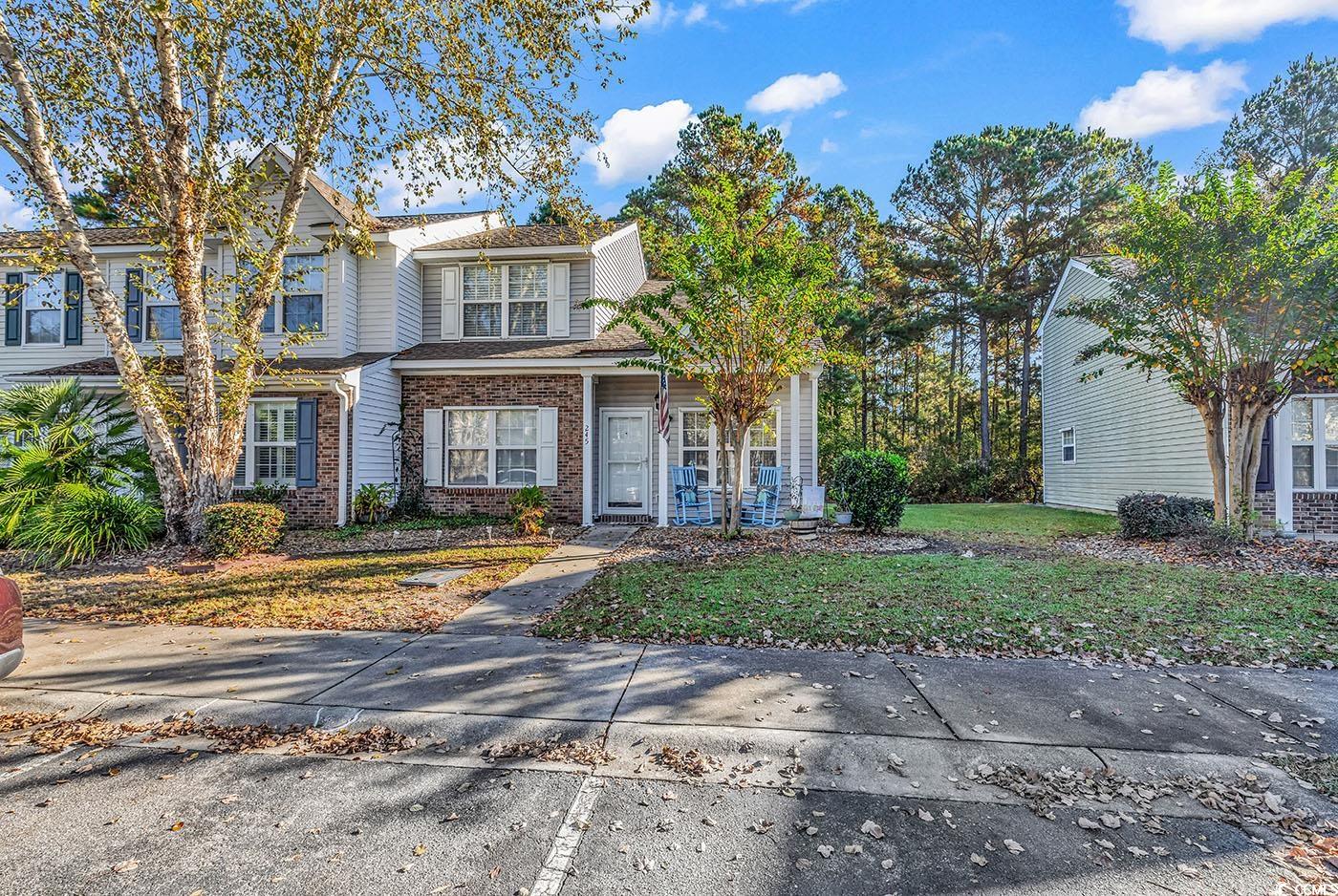 View of front of property with a front lawn