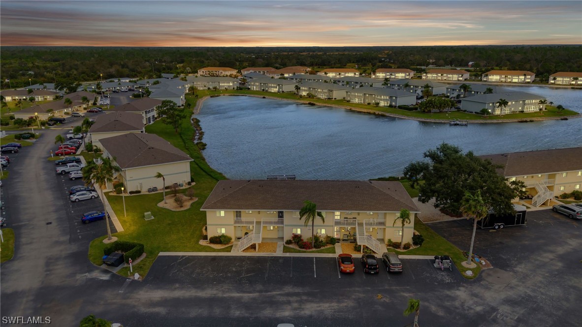 an aerial view of a house with a ocean view