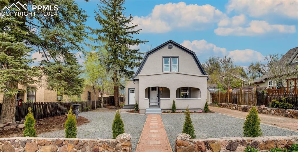 View of front of home featuring covered porch