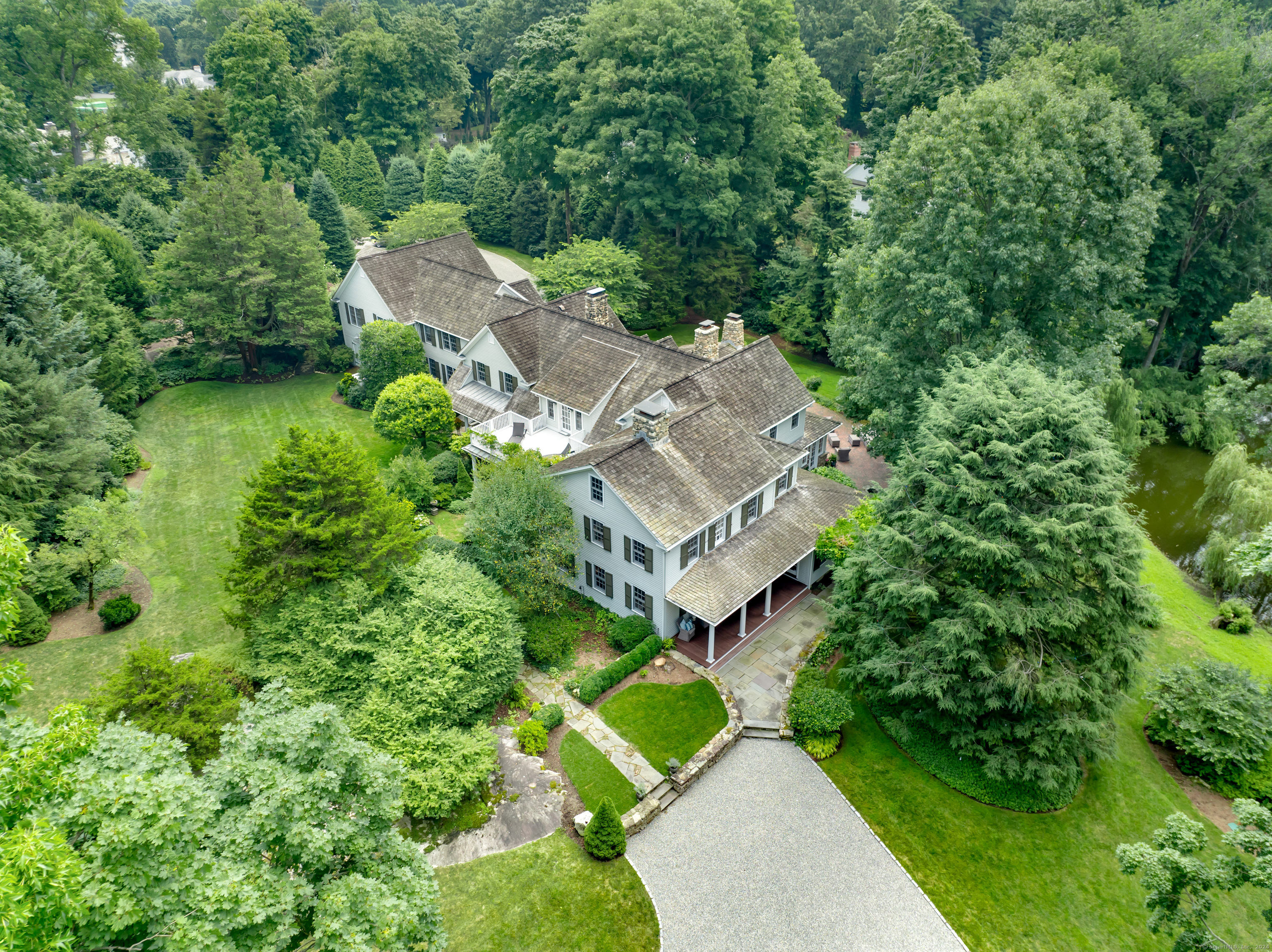 an aerial view of a house with a garden