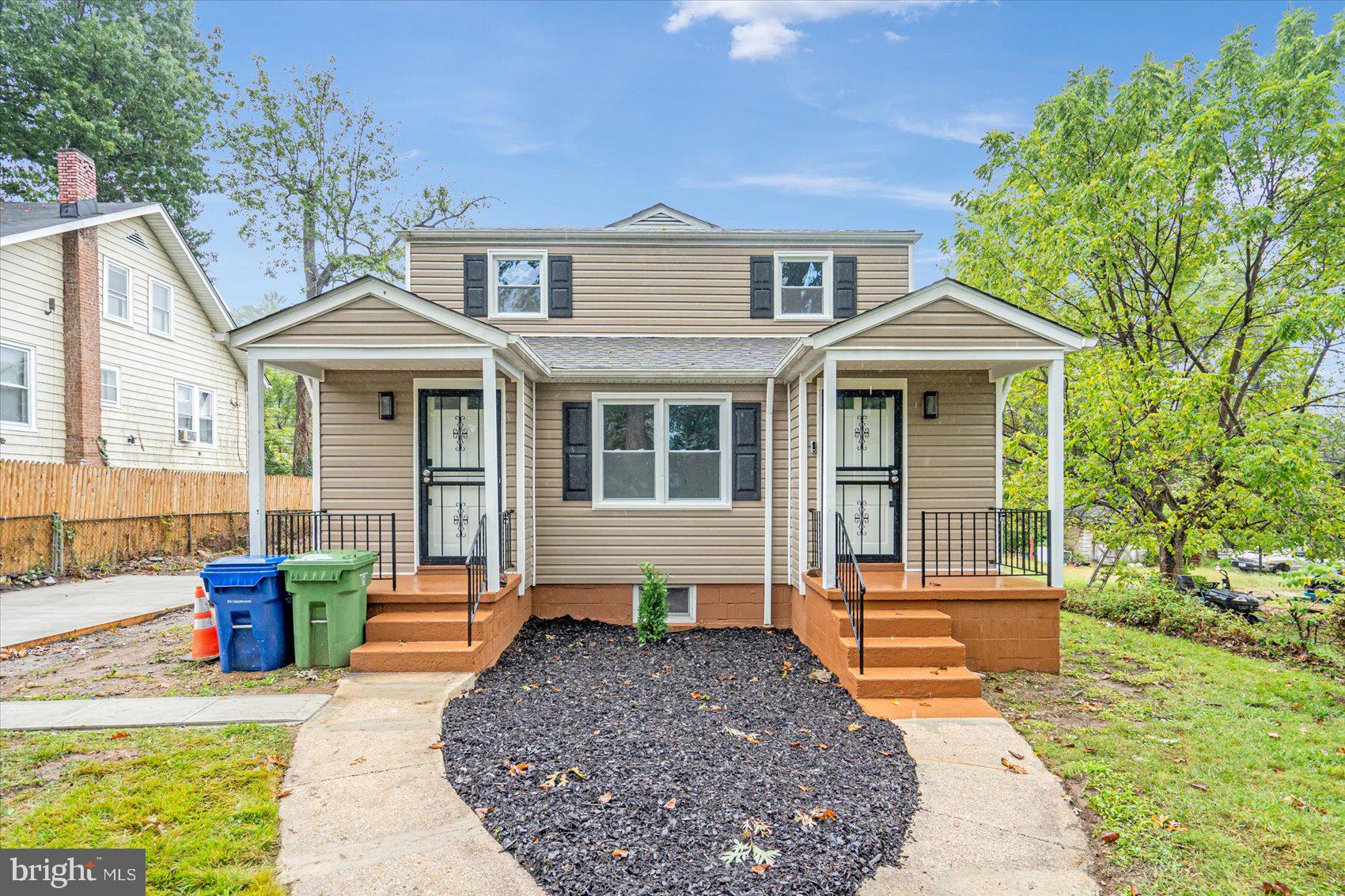 a front view of a house with porch