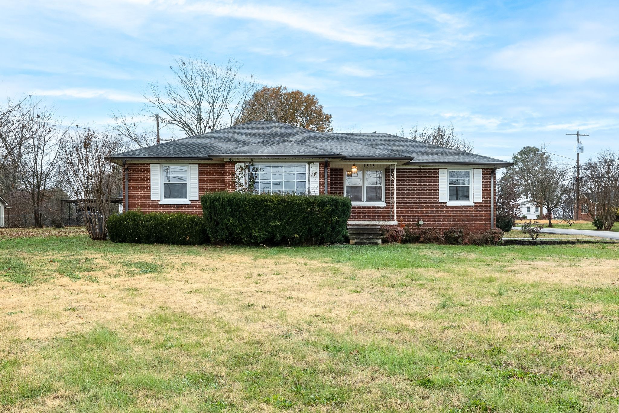 front view of a house with a yard