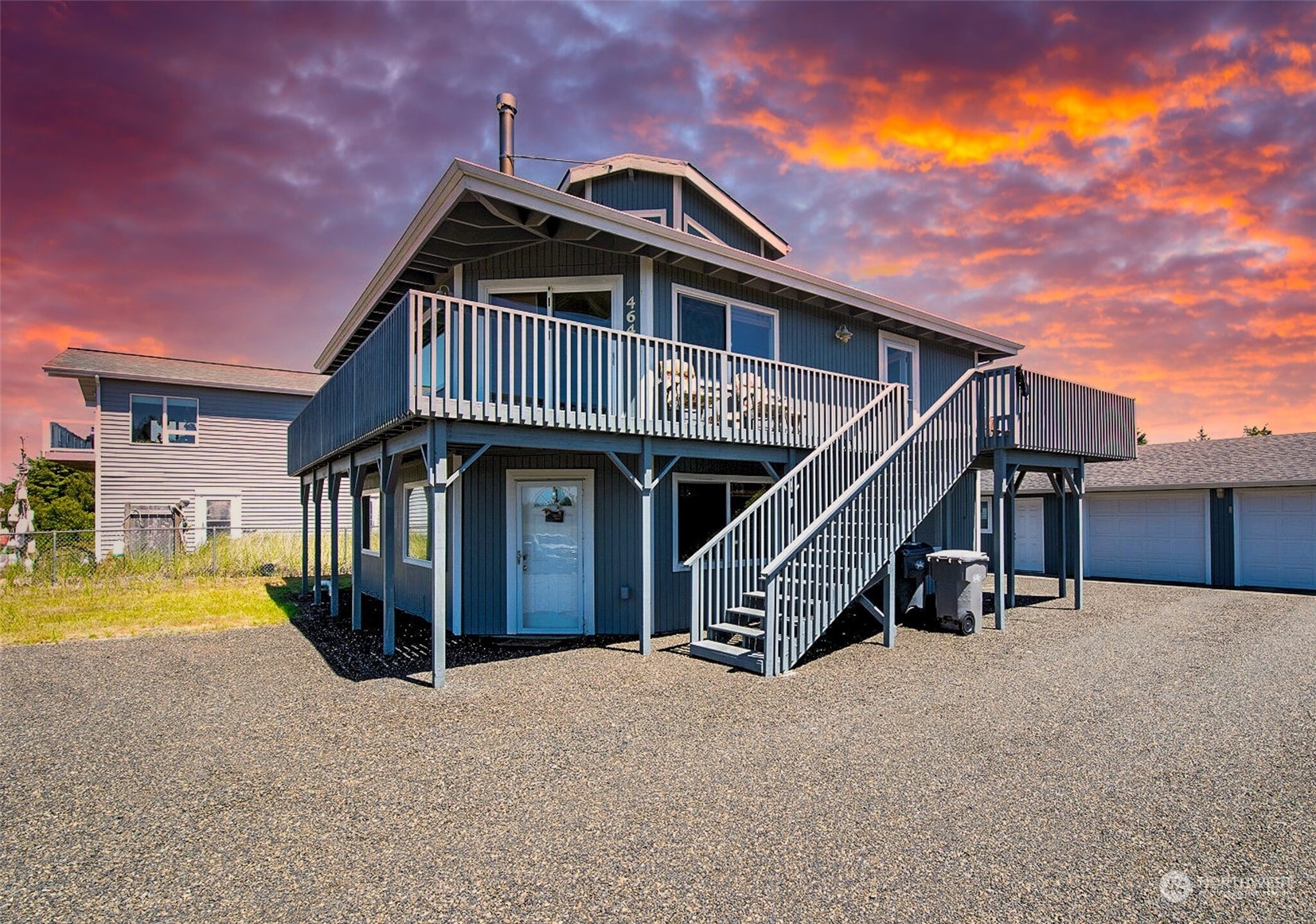 a view of a house with a roof deck