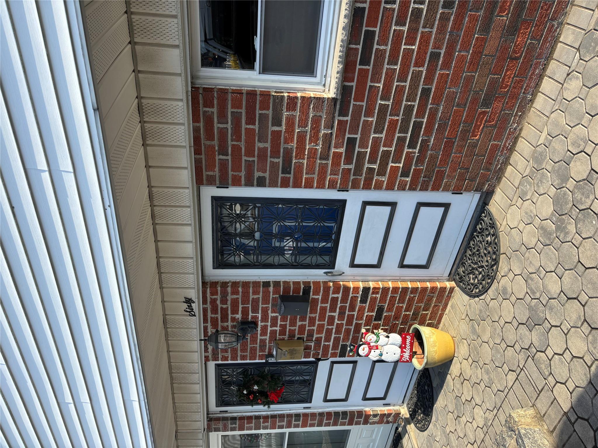 a front view of a house with entryway