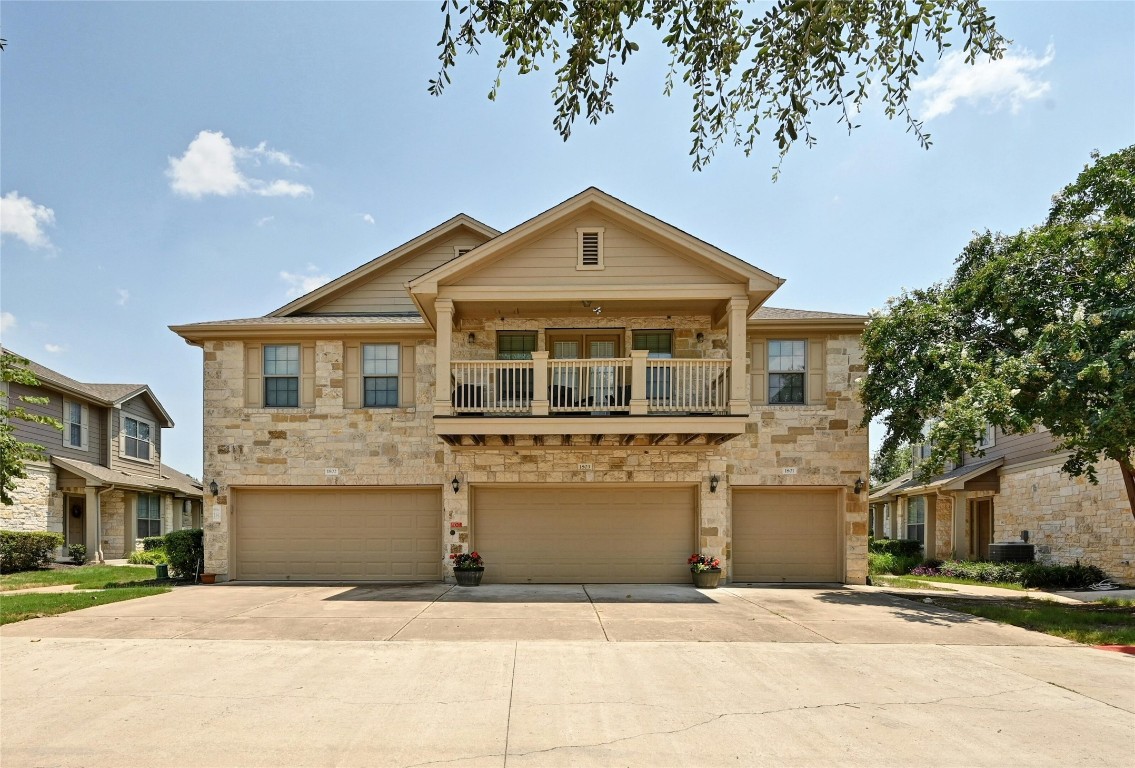 a front view of a house with yard