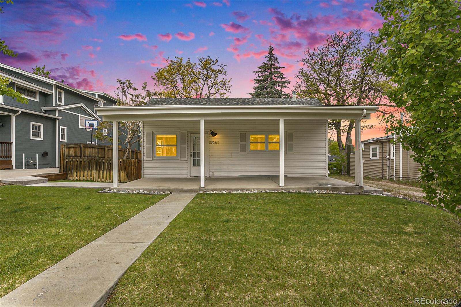 front view of a house with a yard