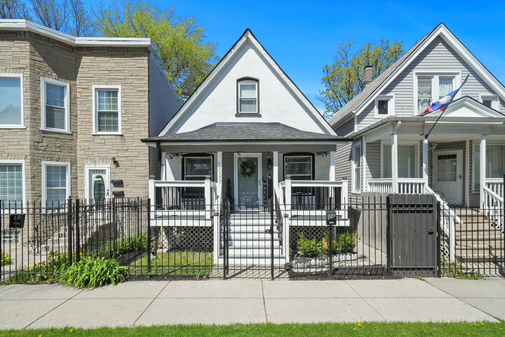 a front view of a house with a porch