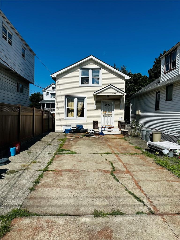 View of the front of property from where the driveway starts.