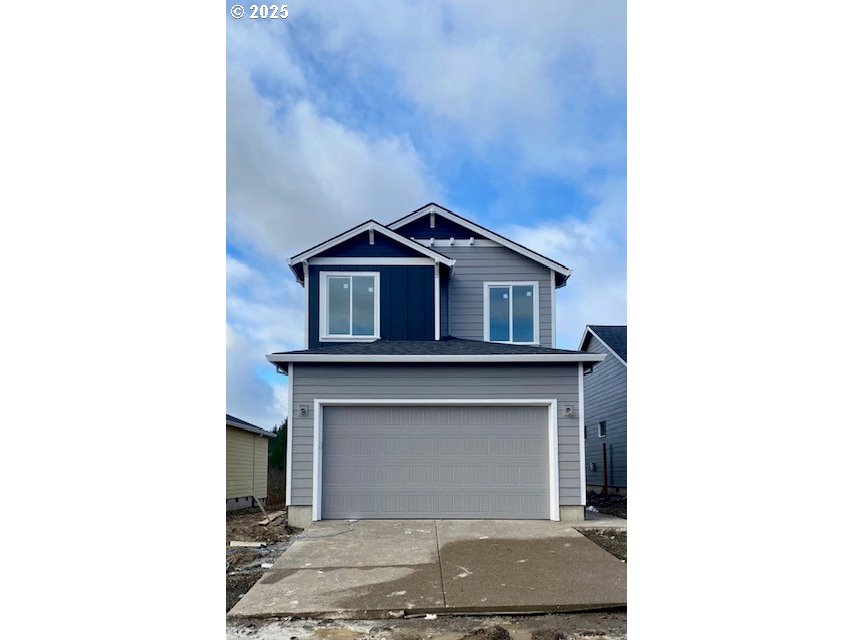 a view of a house with a garage