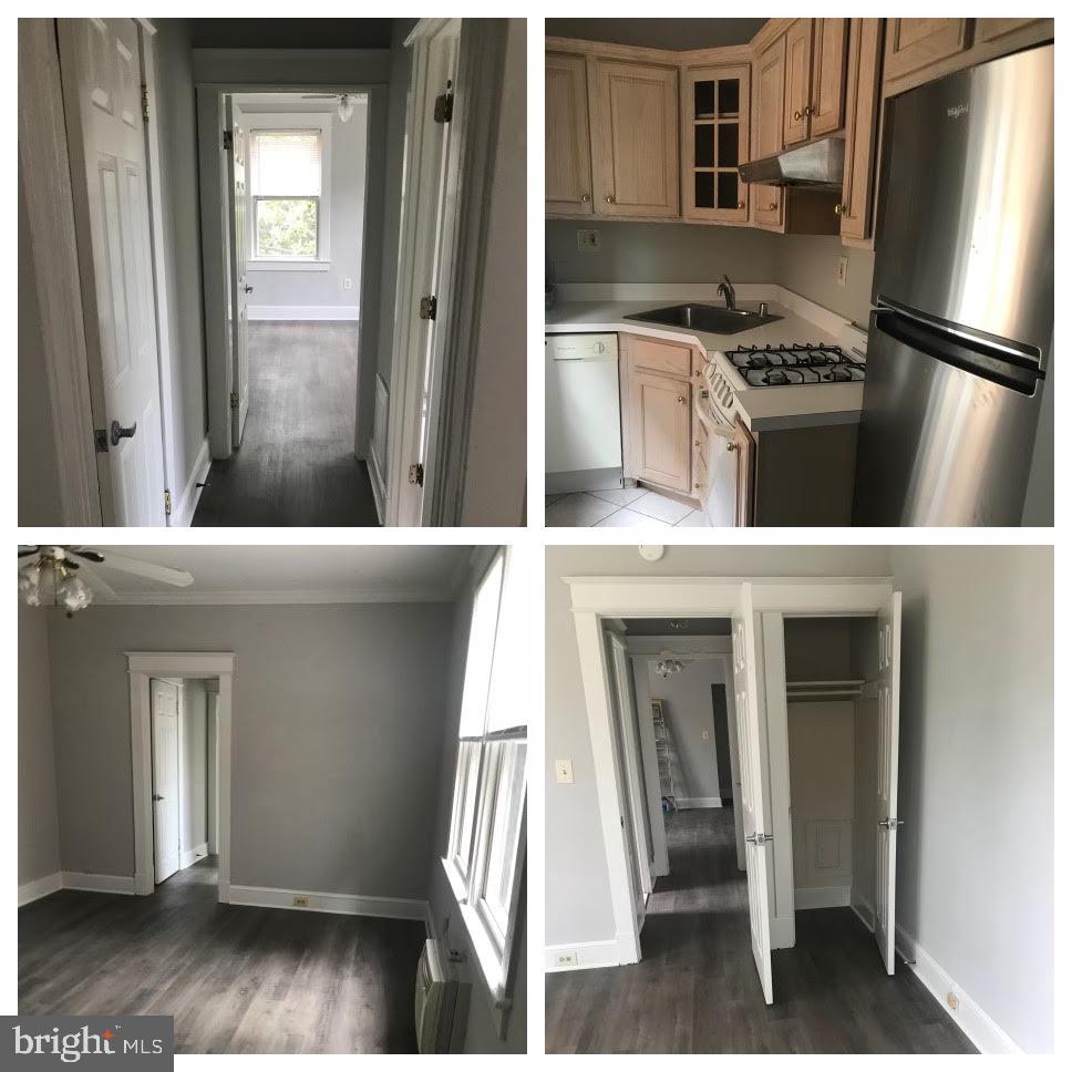 a kitchen with a refrigerator and a sink