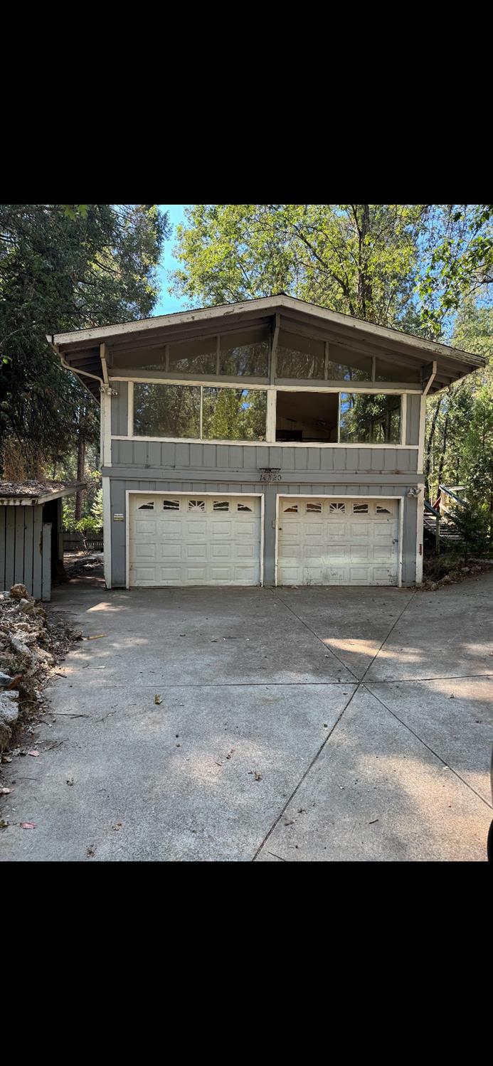 a view of house with outdoor space