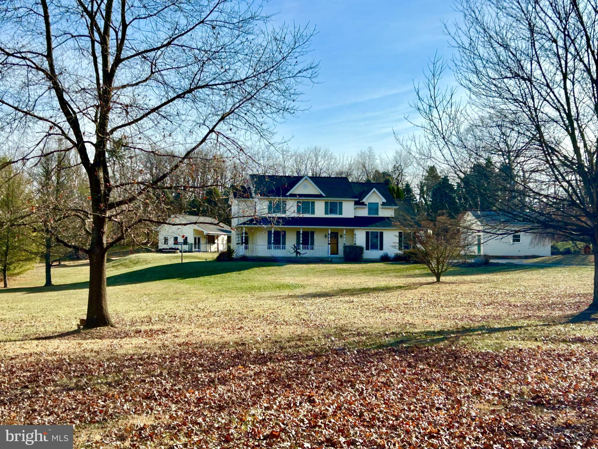 a house with trees in front of it