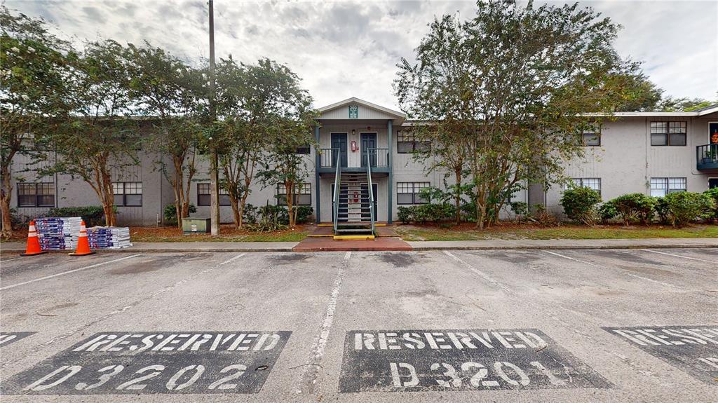 a front view of a building with street view