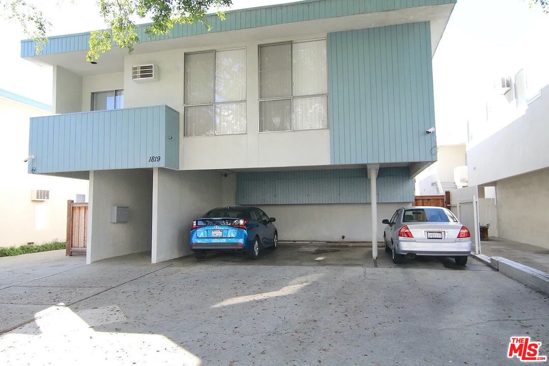 a car parked in front of a house