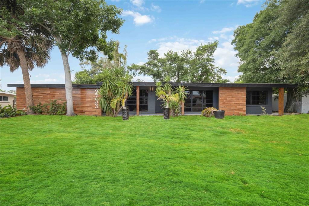 front view of a house with a yard