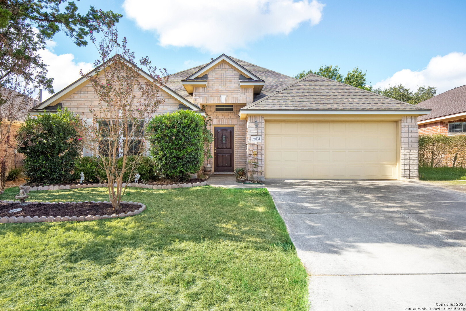 a front view of house with yard